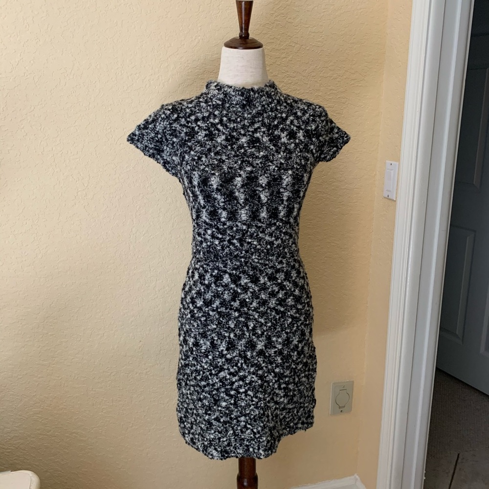 Black and white marled wool form-fitting dress.